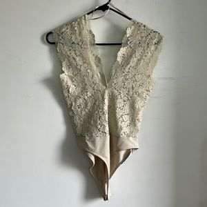 Has not been worn. It is small for me. Feels like xs